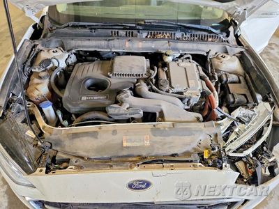 Zdjęcie 11 z 12 samochodu: 2017 FORD FUSION SE HYBRID VIN:3FA6P0LU9HR287263 - miniatura
