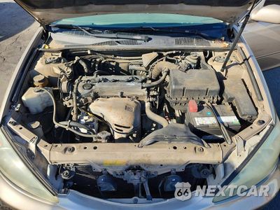 Zdjęcie 11 z 12 samochodu: 2002 TOYOTA CAMRY LE VIN:4T1BE30K62U025862 - miniatura