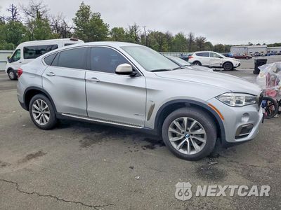 Czwarte zdjęcie samochodu z boku: 2019 BMW X6 XDRIVE35I VIN:5UXKU2C54K0Z64716 - miniatura