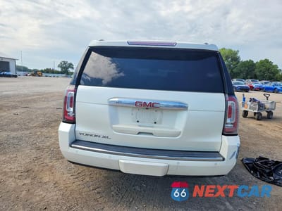 Zdjęcie 7 z 14 samochodu: 2015 GMC YUKON XL DENALI VIN:1GKS2JKJ8FR663131 - miniatura