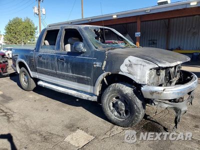 Czwarte zdjęcie samochodu z boku: 2001 FORD F150 SUPERCREW VIN:1FTRW08L61KA55692 - miniatura