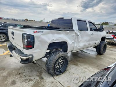 Trzecie zdjęcie samochodu z tyłu: 2017 CHEVROLET SILVERADO K1500 LT VIN:3GCUKRECXHG341576 - miniatura