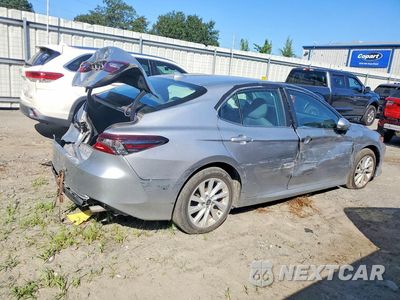 Trzecie zdjęcie samochodu z tyłu: 2024 TOYOTA CAMRY LE VIN:4T1C11AK8RU864277 - miniatura