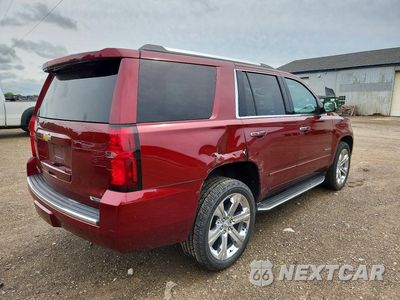 Trzecie zdjęcie samochodu z tyłu: 2017 CHEVROLET TAHOE K1500 PREMIER VIN:1GNSKCKC4HR114190 - miniatura