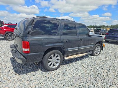 Trzecie zdjęcie samochodu z tyłu: 2003 CHEVROLET TAHOE C1500 VIN:1GNEC13ZX3R312539 - miniatura
