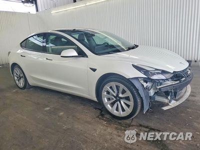 Czwarte zdjęcie samochodu z boku: 2022 TESLA MODEL 3 VIN:5YJ3E1EB5NF289738 - miniatura