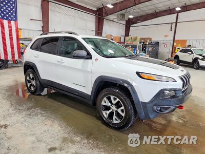 Czwarte zdjęcie samochodu z boku: 2016 JEEP CHEROKEE TRAILHAWK VIN:1C4PJMBS3GW361683 - miniatura