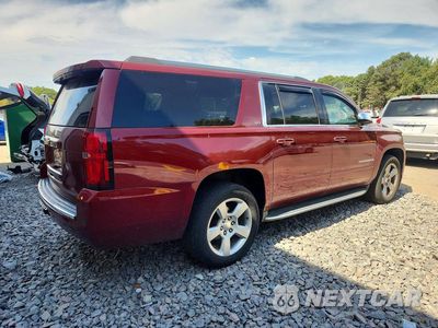 Trzecie zdjęcie samochodu z tyłu: 2016 CHEVROLET SUBURBAN K1500 LTZ VIN:1GNSKJKC6GR285252 - miniatura