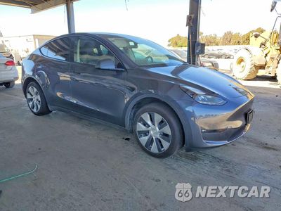 Czwarte zdjęcie samochodu z boku: 2023 TESLA MODEL Y VIN:7SAYGDEE1PF879470 - miniatura