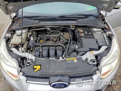 Zdjęcie 11 z 12 samochodu: 2013 FORD FOCUS TITANIUM VIN:1FADP3N20DL191681 - miniatura