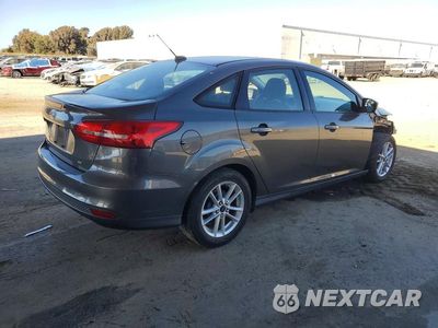 Trzecie zdjęcie samochodu z tyłu: 2016 FORD FOCUS SE VIN:1FADP3F27GL254634 - miniatura