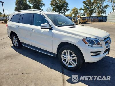 Czwarte zdjęcie samochodu z boku: 2013 MERCEDES-BENZ GL 450 4MATIC VIN:4JGDF7CE3DA227078 - miniatura