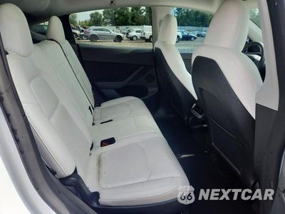 Zdjęcie 10 z 12 samochodu: 2023 TESLA MODEL Y VIN:7SAYGAEE9PF776974 - miniatura