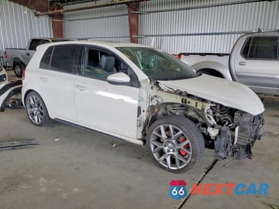 Czwarte zdjęcie samochodu z boku: 2013 VOLKSWAGEN GTI VIN:WVWGD7AJ7DW134297 - miniatura