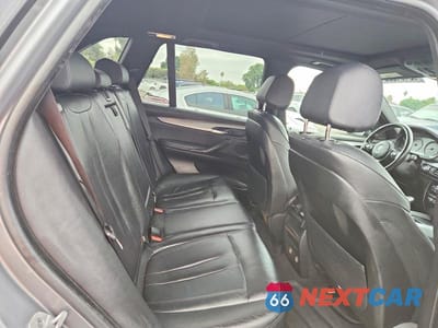 Zdjęcie 11 z 13 samochodu: 2014 BMW X5 XDRIVE35I VIN:5UXKR0C59E0C26469 - miniatura