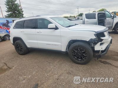 Czwarte zdjęcie samochodu z boku: 2014 JEEP GRAND CHEROKEE LAREDO VIN:1C4RJFAG3EC128497 - miniatura