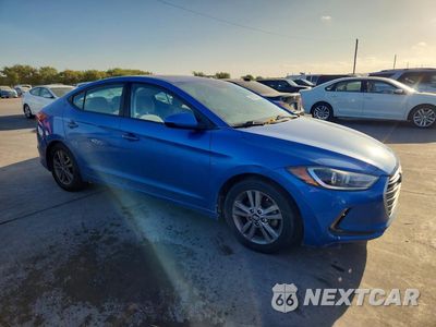 Czwarte zdjęcie samochodu z boku: 2018 HYUNDAI ELANTRA VALUE EDITION VIN:5NPD84LF5JH354277 - miniatura