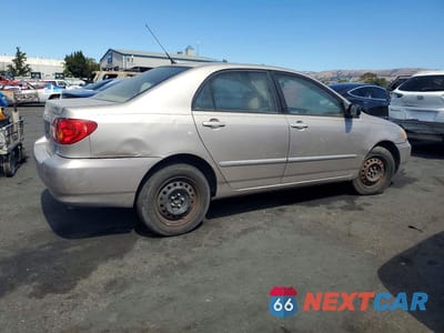 Trzecie zdjęcie samochodu z tyłu: 2003 TOYOTA COROLLA LE VIN:1NXBR32E33Z010832 - miniatura