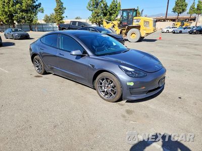 Czwarte zdjęcie samochodu z boku: 2023 TESLA MODEL 3 VIN:5YJ3E1EA3PF418344 - miniatura