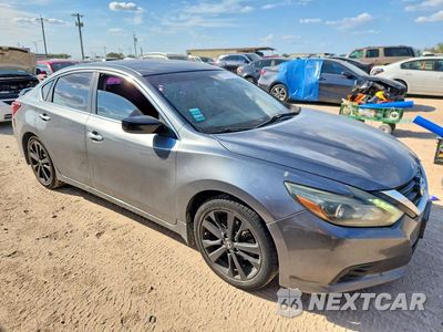 Czwarte zdjęcie samochodu z boku: 2017 NISSAN ALTIMA 2.5 SR VIN:1N4AL3AP2HC226453 - miniatura
