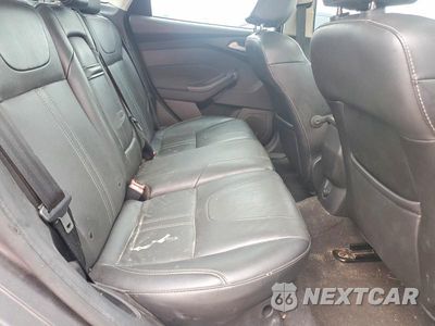 Zdjęcie 10 z 12 samochodu: 2013 FORD FOCUS TITANIUM VIN:1FADP3J29DL326744 - miniatura