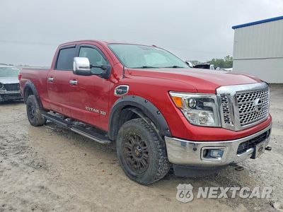 Czwarte zdjęcie samochodu z boku: 2017 NISSAN TITAN XD SL VIN:1N6AA1F48HN512358 - miniatura