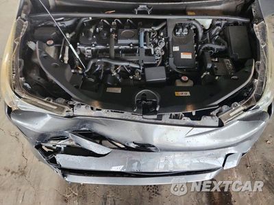 Zdjęcie 11 z 12 samochodu: 2017 TOYOTA PRIUS TWO VIN:JTDKBRFU3H3036373 - miniatura