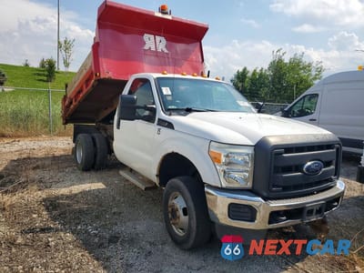 Czwarte zdjęcie samochodu z boku: 2015 FORD F350 SUPER DUTY DUMP TRUCK VIN:1FDRF3H69FEB00315 - miniatura