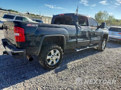 Trzecie zdjęcie samochodu z tyłu: 2017 GMC SIERRA K2500 SLT VIN:1GT12TEY5HF236053 - miniatura