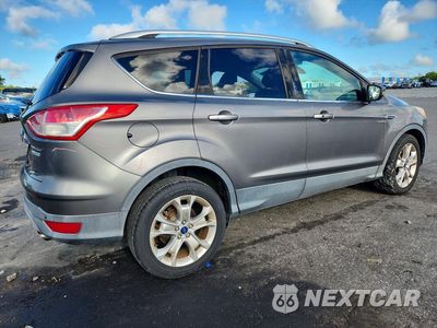 Trzecie zdjęcie samochodu z tyłu: 2014 FORD ESCAPE TITANIUM VIN:1FMCU0J99EUB23161 - miniatura