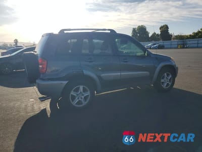 Trzecie zdjęcie samochodu z tyłu: 2004 TOYOTA RAV4 BASE VIN:JTEGD20V740030821 - miniatura