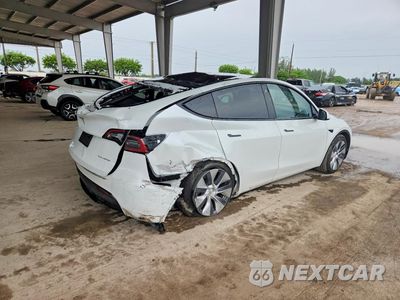 Trzecie zdjęcie samochodu z tyłu: 2023 TESLA MODEL Y VIN:7SAYGDEE3PA107081 - miniatura