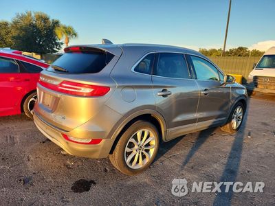 Trzecie zdjęcie samochodu z tyłu: 2016 LINCOLN MKC SELECT VIN:5LMCJ2C91GUJ08851 - miniatura