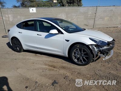 Czwarte zdjęcie samochodu z boku: 2023 TESLA MODEL 3 VIN:5YJ3E1EA1PF556643 - miniatura
