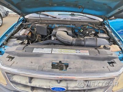 Zdjęcie 11 z 12 samochodu: 1997 FORD F150 VIN:1FTDX18W7VKC55056 - miniatura