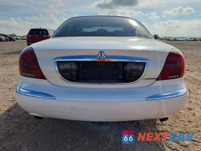 Zdjęcie 6 z 12 samochodu: 1998 LINCOLN CONTINENTAL VIN:1LNFM97V3WY640553 - miniatura