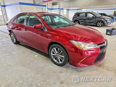 Czwarte zdjęcie samochodu z boku: 2015 TOYOTA CAMRY HYBRID SE VIN:4T1BD1FK5FU168581 - miniatura