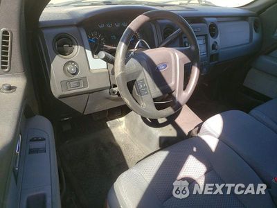 Zdjęcie 8 z 12 samochodu: 2014 FORD F150 VIN:1FTNF1EFXEKD63988 - miniatura