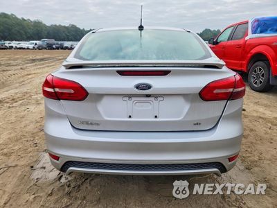 Zdjęcie 6 z 12 samochodu: 2018 FORD FOCUS SE VIN:1FADP3F2XJL279888 - miniatura