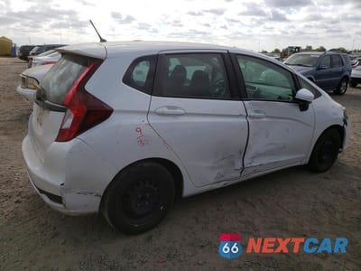 Trzecie zdjęcie samochodu z tyłu: 2020 HONDA FIT LX VIN:3HGGK5H45LM711130 - miniatura