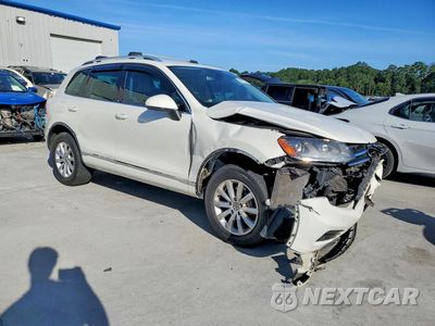 Czwarte zdjęcie samochodu z boku: 2012 VOLKSWAGEN TOUAREG V6 TDI VIN:WVGFK9BP0CD002682 - miniatura