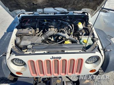 Zdjęcie 11 z 12 samochodu: 2009 JEEP WRANGLER UNLIMITED RUBICON VIN:1J4GA69119L745193 - miniatura