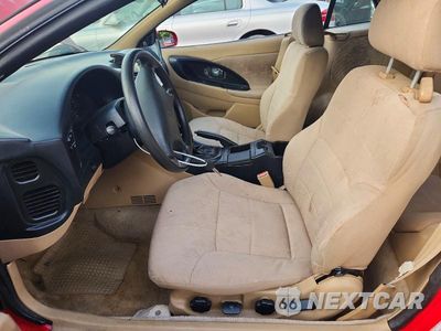 Zdjęcie 7 z 12 samochodu: 1999 MITSUBISHI ECLIPSE SPYDER GS VIN:4A3AX35G6XE134531 - miniatura