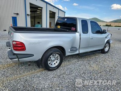 Trzecie zdjęcie samochodu z tyłu: 2002 FORD F150 VIN:1FTRX07W82KE00974 - miniatura
