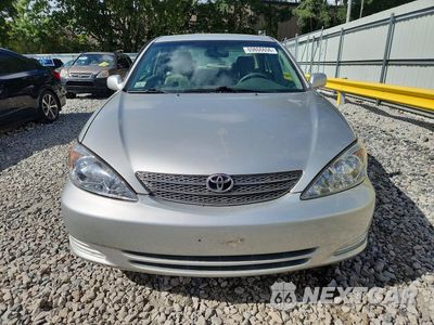 Piąte zdjęcie samochodu w środku: 2004 TOYOTA CAMRY LE VIN:4T1BE32K54U874557 - miniatura