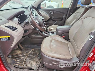 Zdjęcie 7 z 13 samochodu: 2014 HYUNDAI TUCSON LIMITED VIN:KM8JUCAG1EU816149 - miniatura