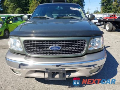 Piąte zdjęcie samochodu w środku: 2001 FORD EXPEDITION EDDIE BAUER VIN:1FMRU17L11LA77974 - miniatura