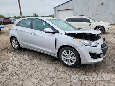 Czwarte zdjęcie samochodu z boku: 2014 HYUNDAI ELANTRA GT BASE VIN:KMHD35LH6EU207513 - miniatura