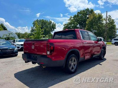 Czwarte zdjęcie samochodu z boku: 2022 HONDA RIDGELINE RTL VIN:5FPYK3F72NB028708 - miniatura