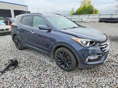 Czwarte zdjęcie samochodu z boku: 2017 HYUNDAI SANTA FE SPORT 2.0T VIN:5XYZUDLA0HG402386 - miniatura